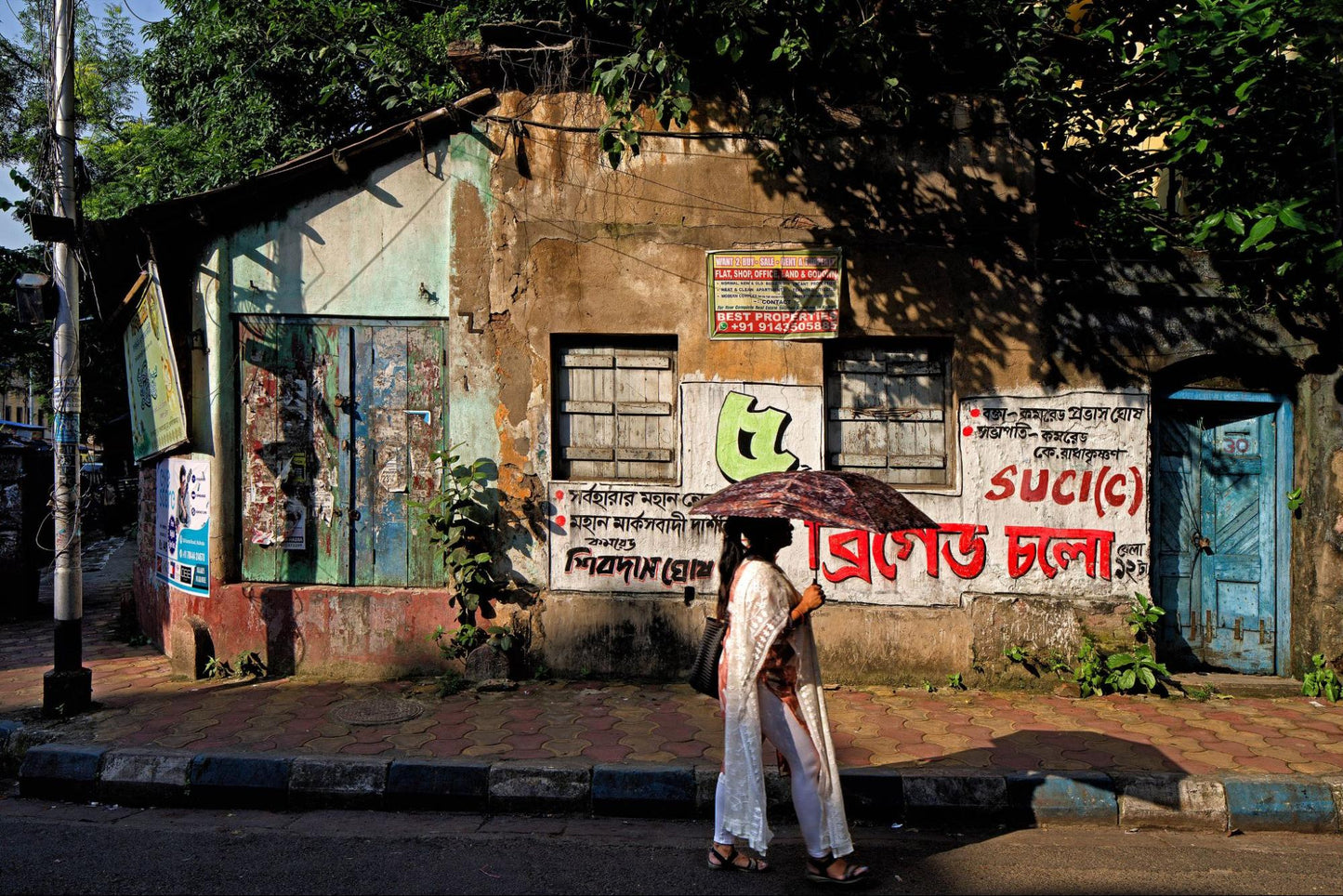 Woman with Umbrella, Kolkata 2023