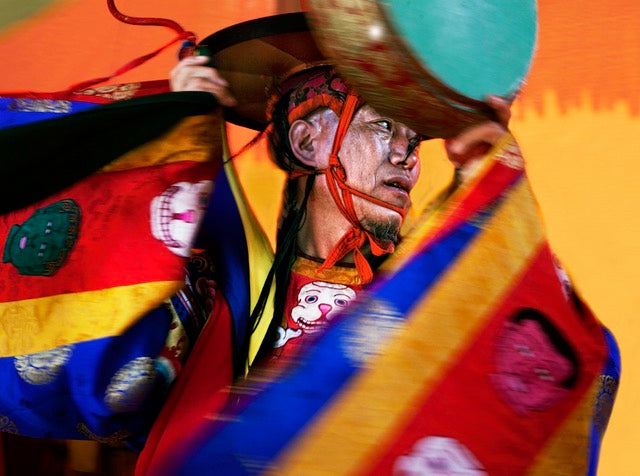 Black Hat Dancer with Drum