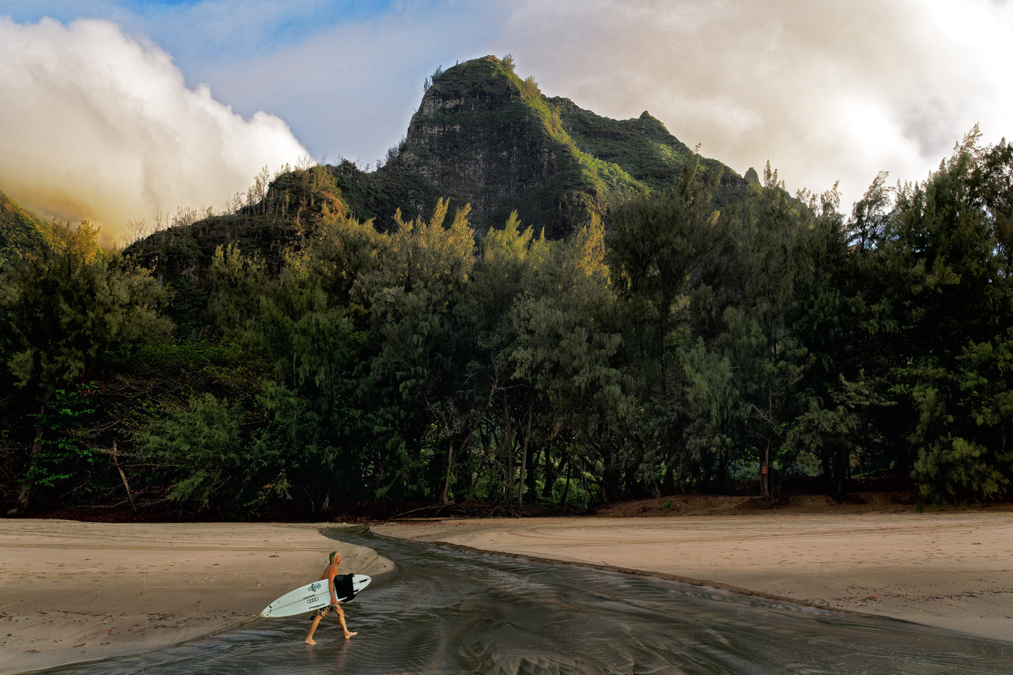 Marco the Surfer Crosses Limahuli Muliwai, 2022